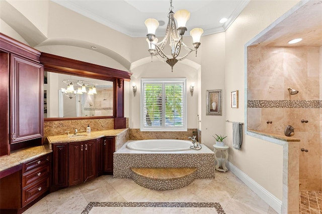 full bathroom with an inviting chandelier, ornamental molding, vanity, a walk in shower, and a bath