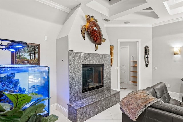 living area featuring baseboards, visible vents, a premium fireplace, tile patterned floors, and crown molding