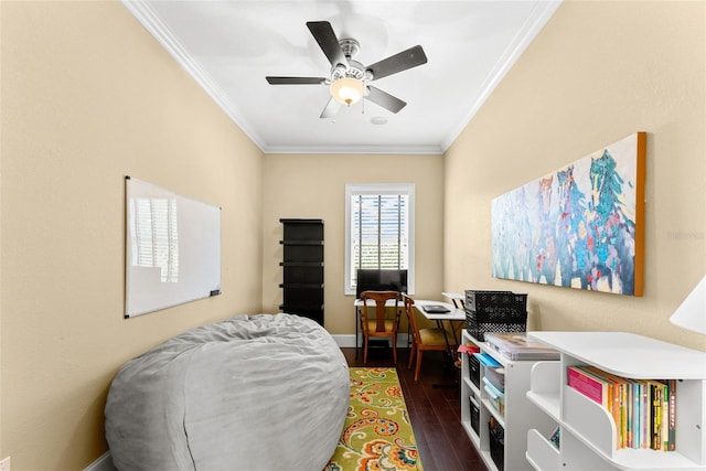 bedroom featuring dark wood-style floors, crown molding, baseboards, and a ceiling fan