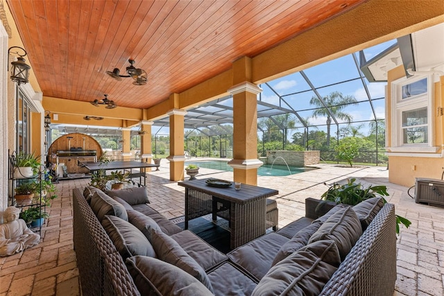 view of patio / terrace featuring outdoor dining area, outdoor lounge area, a ceiling fan, a lanai, and an outdoor pool