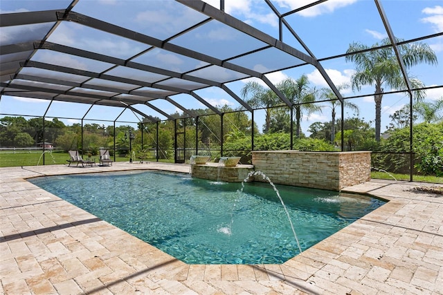 outdoor pool with glass enclosure and a patio