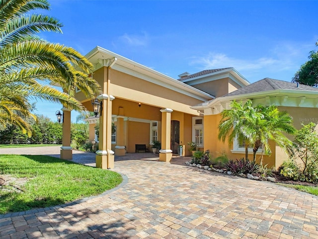 view of front of home featuring stucco siding