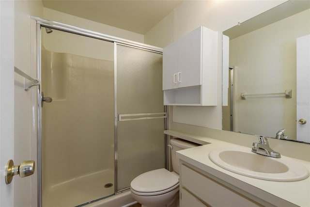 7712 Hillside Ct Unit 202, Hudson, FL 34667 - bathroom with a shower stall, vanity, and toilet
