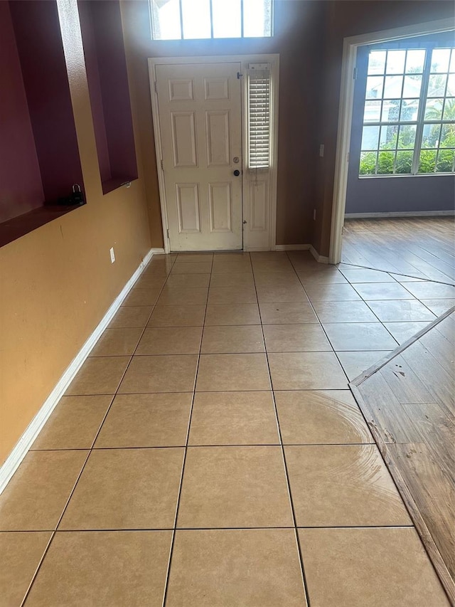 tiled entryway featuring plenty of natural light