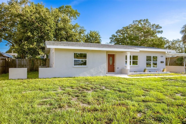 ranch-style house with a front lawn