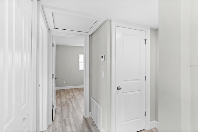 hallway featuring light hardwood / wood-style flooring