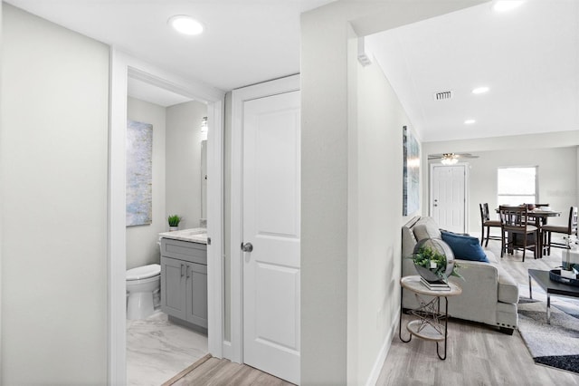 hall featuring light hardwood / wood-style floors