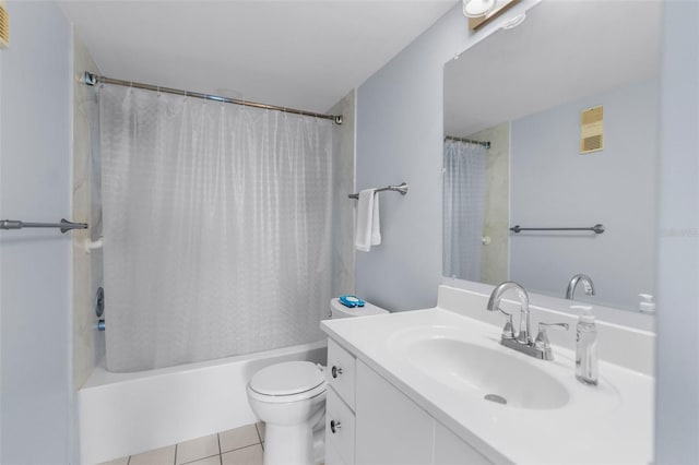 full bathroom featuring tile patterned flooring, vanity, toilet, and shower / bath combo