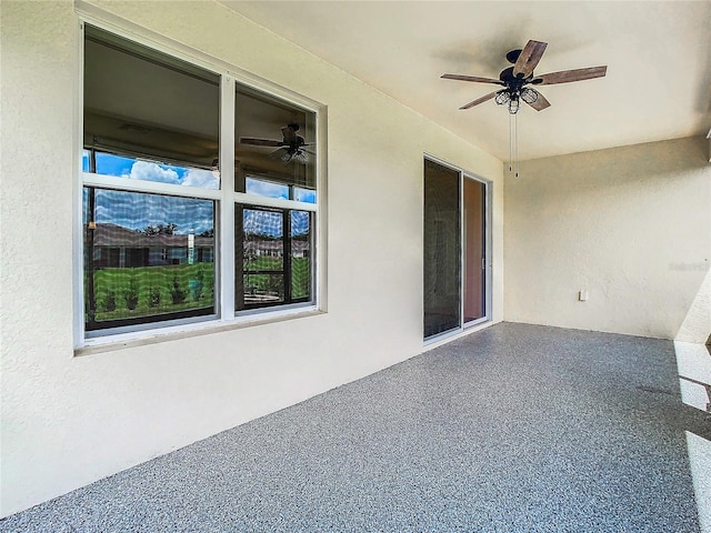 view of patio with ceiling fan