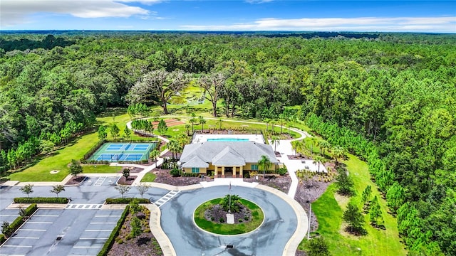 bird's eye view featuring a forest view