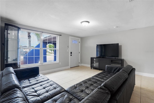 tiled living room with a textured ceiling