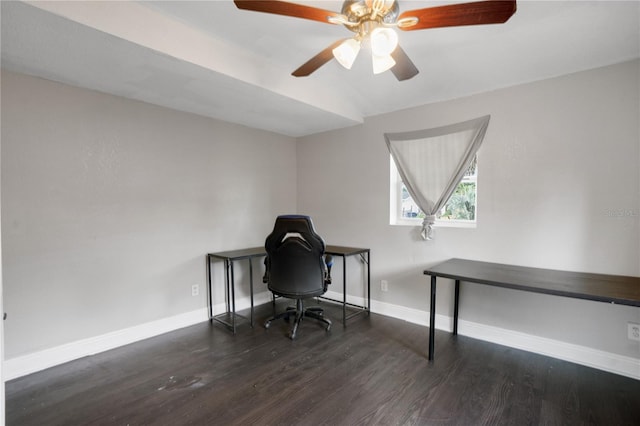 unfurnished office featuring ceiling fan and dark hardwood / wood-style flooring