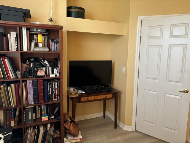 office area with light hardwood / wood-style flooring