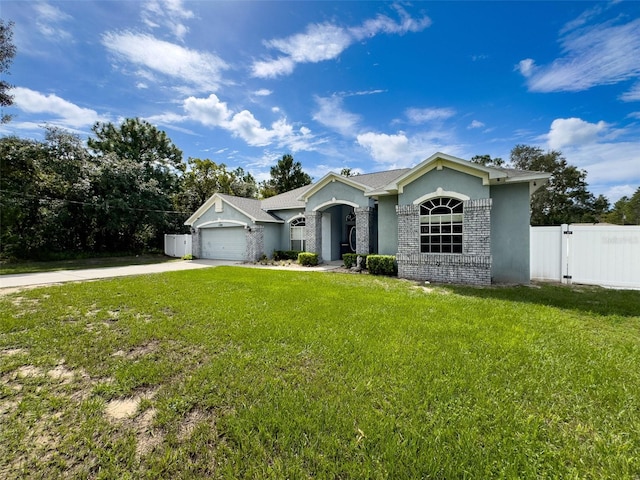 single story home featuring a garage and a front lawn