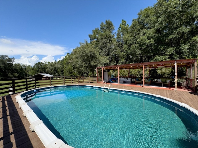 view of pool with a deck