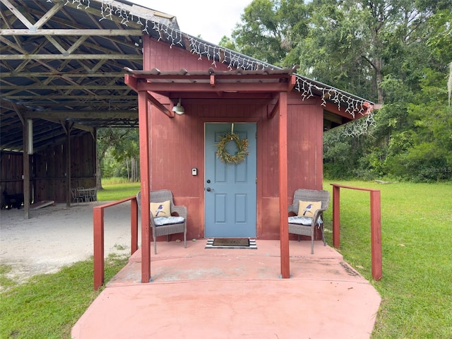 view of outdoor structure with a lawn