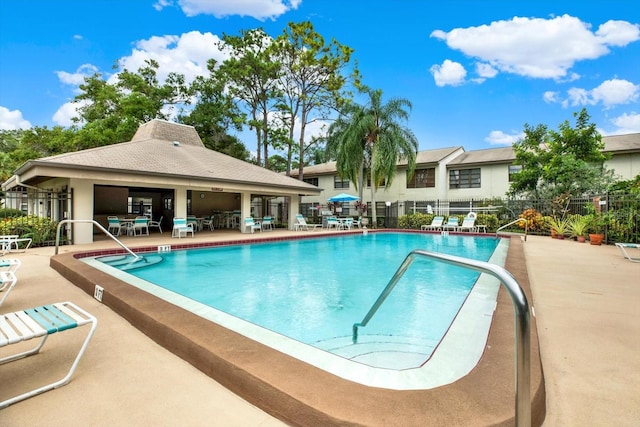 view of pool featuring a patio