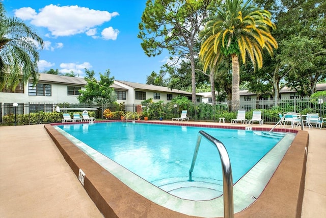 view of pool featuring a patio area