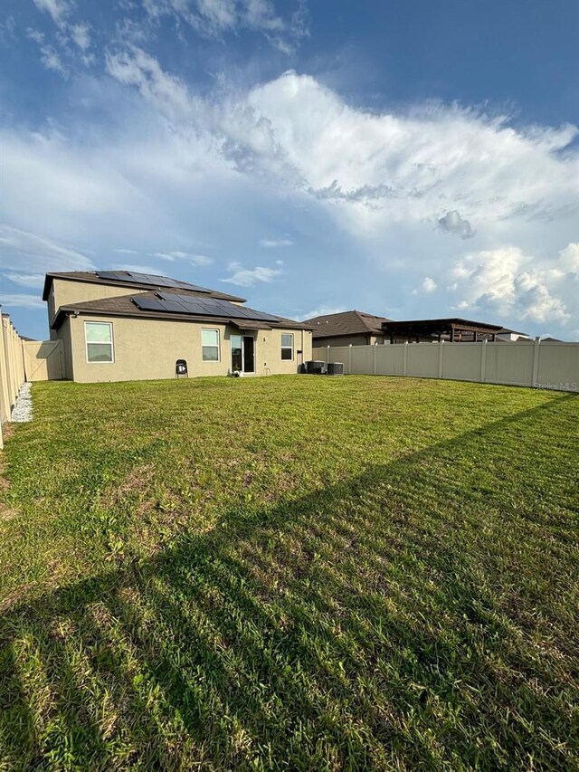 15434 Miller Creek Dr, Sun City Center, FL 33573 - view of yard featuring a fenced backyard