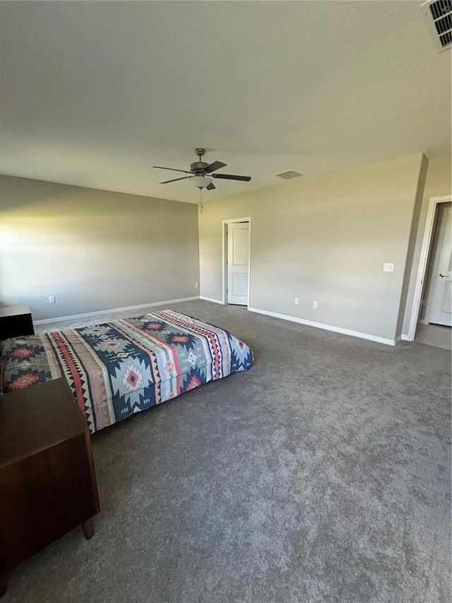 15434 Miller Creek Dr, Sun City Center, FL 33573 - carpeted bedroom featuring baseboards, visible vents, and ceiling fan