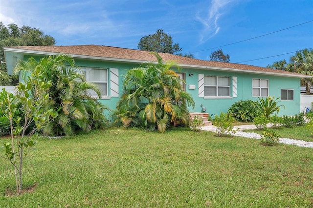 view of front of home with a front yard