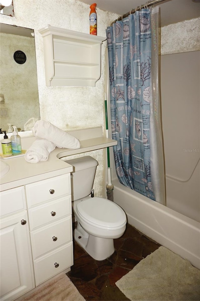 full bathroom with vanity, toilet, and shower / tub combo with curtain