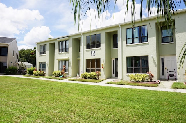 view of front of house with a front lawn