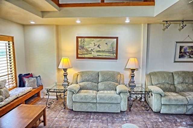 living room featuring dark tile patterned floors