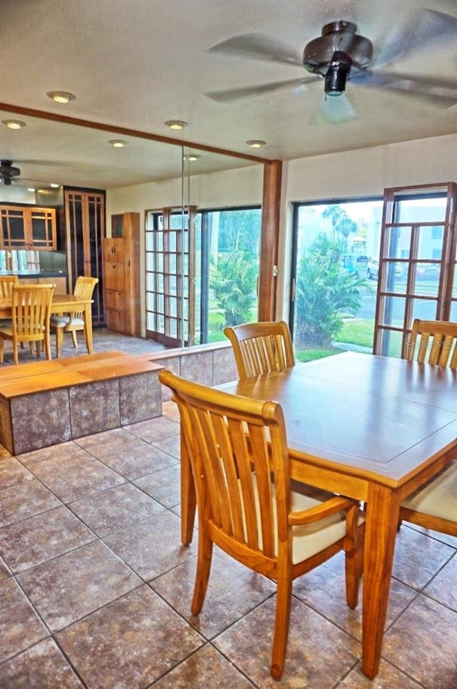 dining room featuring ceiling fan