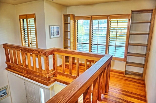 staircase featuring hardwood / wood-style flooring