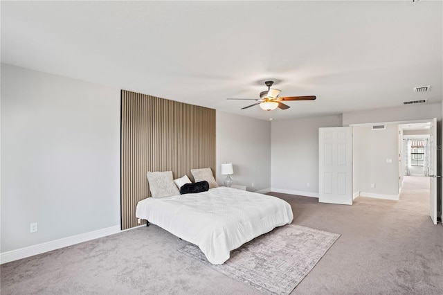 bedroom featuring visible vents, baseboards, and carpet floors