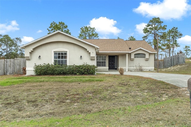 single story home with a front yard