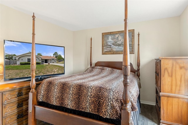 bedroom featuring hardwood / wood-style flooring