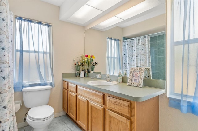 bathroom featuring toilet, tile patterned flooring, vanity, and a shower with curtain