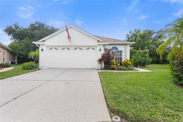 ranch-style house with a garage, central AC, and a front yard