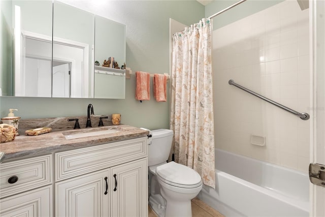 full bathroom featuring tile patterned flooring, vanity, toilet, and shower / bath combo