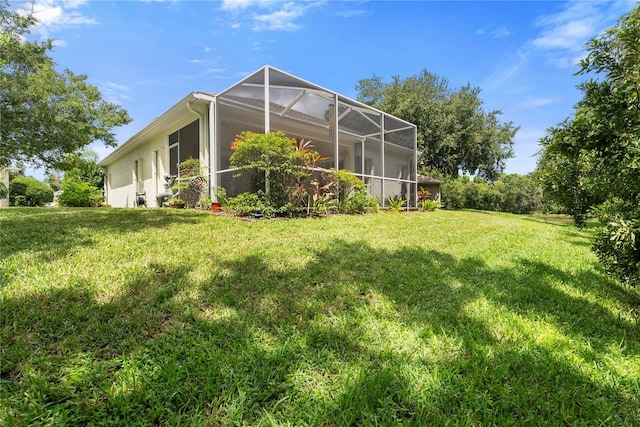 view of yard with a lanai