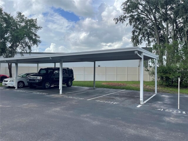 view of parking with a carport