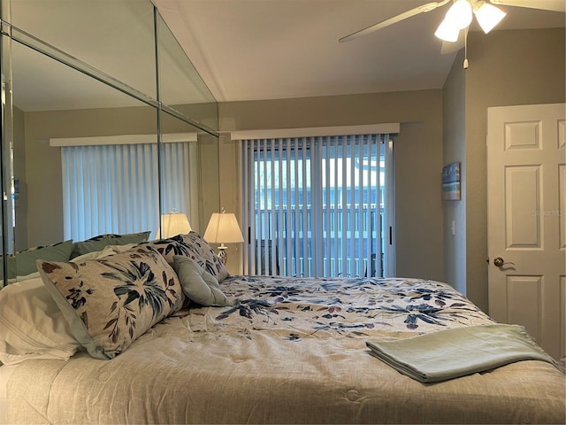 bedroom featuring ceiling fan and a closet