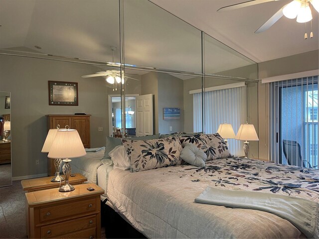 carpeted bedroom featuring vaulted ceiling and ceiling fan