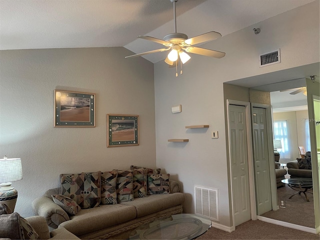 carpeted living room featuring lofted ceiling and ceiling fan