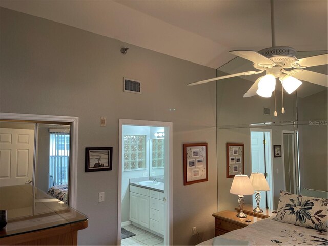 bedroom featuring high vaulted ceiling, sink, ceiling fan, ensuite bathroom, and light tile patterned flooring