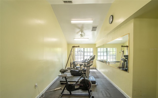 interior space with ceiling fan