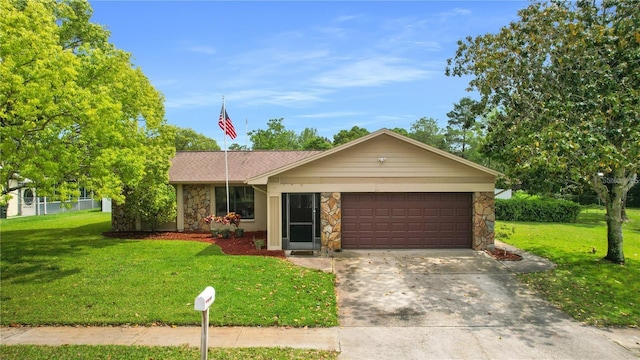 single story home featuring a front yard and a garage