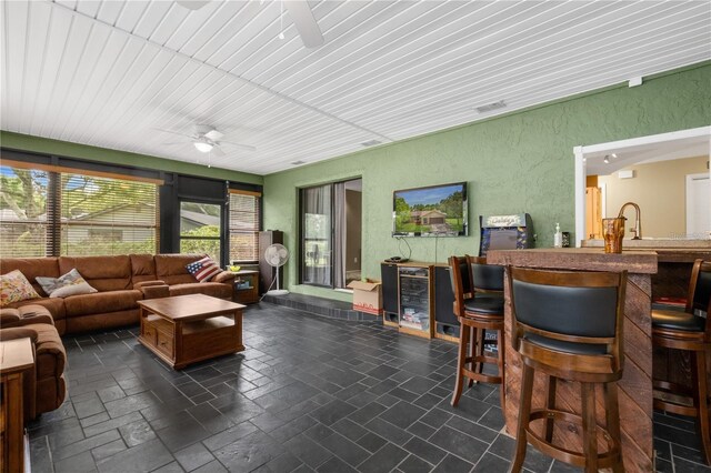 living room with ceiling fan