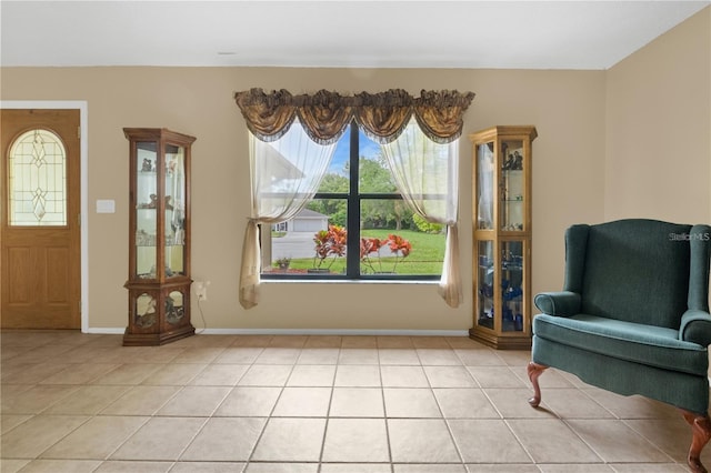 living area featuring light tile patterned floors