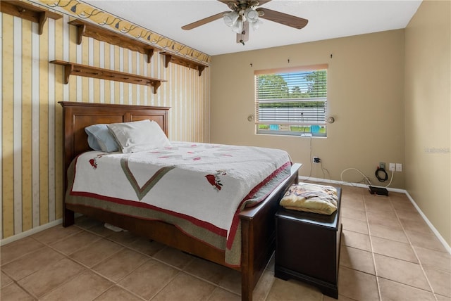 tiled bedroom featuring ceiling fan