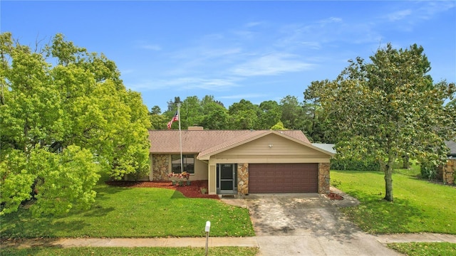 ranch-style home with a front yard and a garage