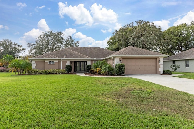 ranch-style house featuring a front lawn and a garage