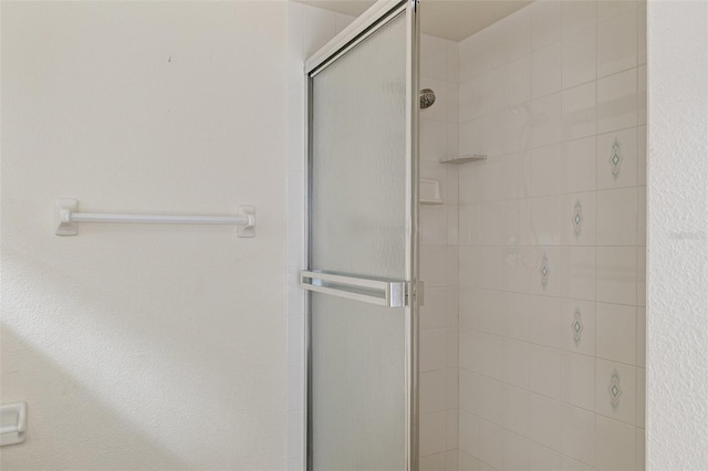 bathroom with an enclosed shower